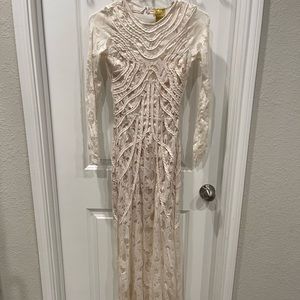 H&M backless dress new without tags never worn. Size 2.